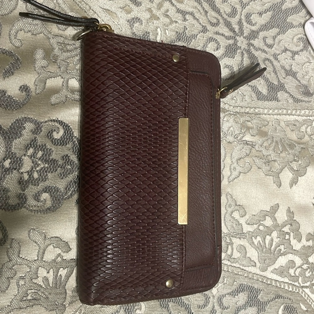 Clutch with card and removable change purse. Deep maroon